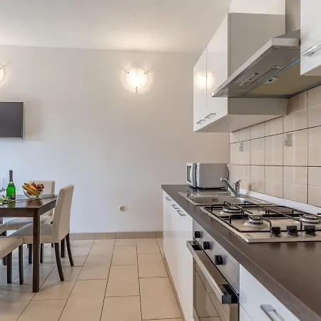 Apartment Waterfront In With Balcony And Barbecue